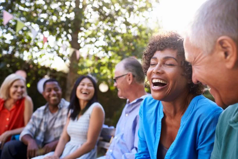 group of friends laughing outside